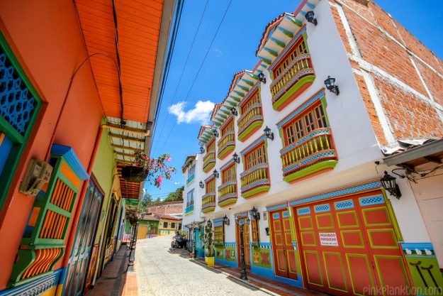 Brightly painted balconies and doors line the town.