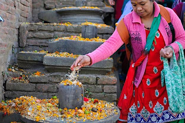 Travel News - Nepalese devotees offering holy grains 'Satbij' mixed of 7 It is believed that dropped seeds in remembrance of beloved ones on the occasion of Bala Chaturdashi rituals, can secure a better place in heaven.
