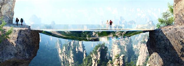 Travel News - china-1 A glass-bottomed bridge that will look "invisible" is being built in Hunan Province, China. Image: Martin Duplantier Architects