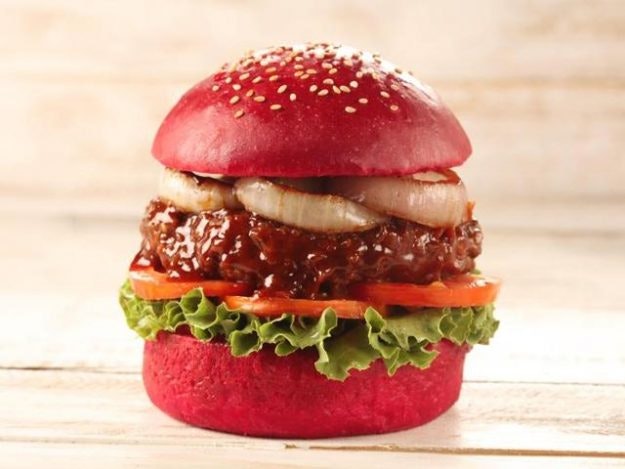 Red burger buns from Genuine Broaster Chicken in Andheri West are part of a trend for colourful burgers in Mumbai. Image: Genuine Broaster Chicken 