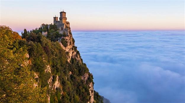 Travel News - sm1 A breath-taking view of San Marino with thick layers of fog rolling in.