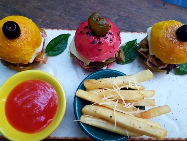 Yellow and pink burgers buns from The Little Door in Mumbai. Image: The Little Door