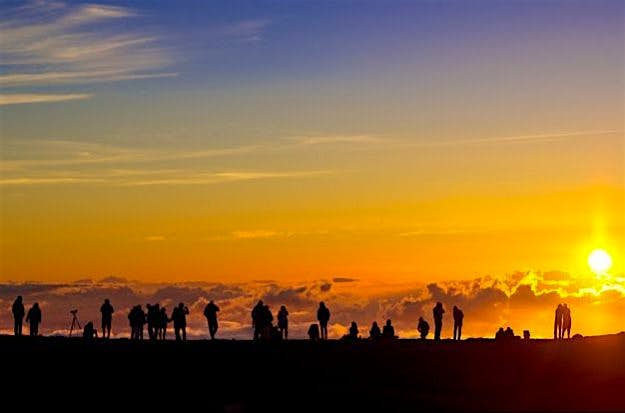 Travel News - Sunset on Haleakala Maui in Hawaii is number one in Kayak's top trending beach destinations. Image: Joseph Pecora/Lonely Planet