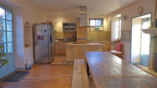 Travel News - CIRE _ Stanley Kubrick Home (16) The bright property has a bright, sun-lit kitchen.