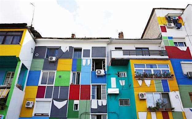 Travel News - Albania. Tirana. Painted Houses. Painted houses in Tirana, Albania. Houses. Image: David Forman