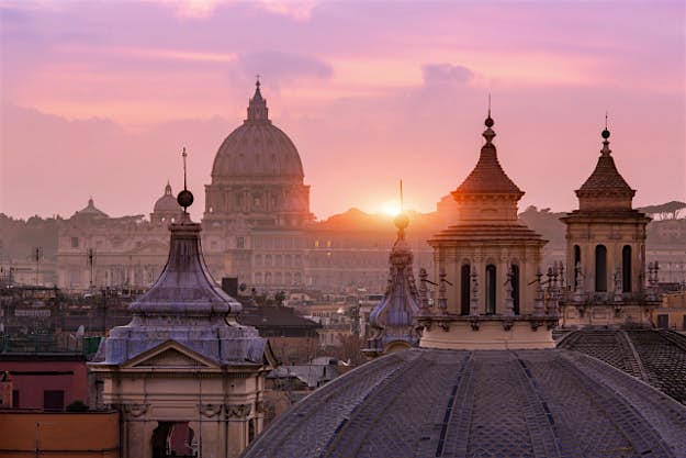 Travel News - GettyImages-163295972 cheap flights Domed roof tops of Santa Maria di Montesanto and Santa Maria dei Miracoli, from the Pincio, Rome, Italy.