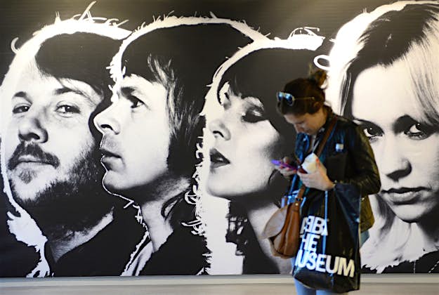 Travel News - ABBAGettyImages-168147931 A visitor, is pictured at the world's first permanent Swedish disco group ABBA's museum, on May 6, 2013 in Stockholm, on the eve of the official opening.