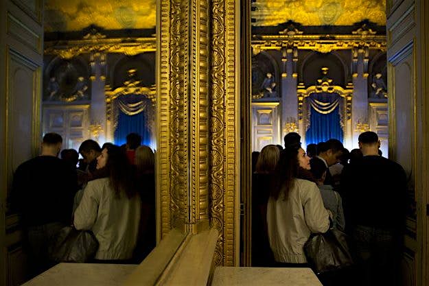 Travel News - FRANCE-CULTURE-DIPLOMACY People listening to a debate are reflected in a mirror on January 27, 2016 during La Nuit des Idees (The night of ideas) held at the Quai d'Orsay in Paris.