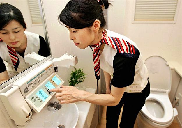 Travel News - TO GO WITH "LIFESTYLE-HEALTH-JAPAN-TOILE Japanese toilets are confusing tourists. Image: Yoshikazu Suno/AFP/Getty Images
