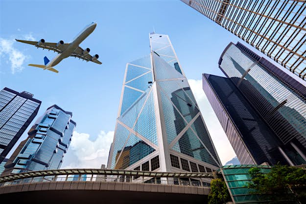 Travel News - Tall city buildings and a plane flying overhead, Hong Kong The safest airlines in the world have been named.