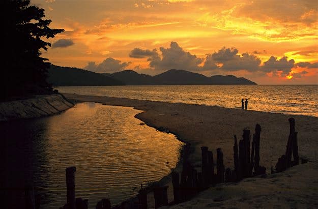 Travel News - Sunset on Ferringhi Beach, Penang Malaysia will likely be the first destination the new flights go to.