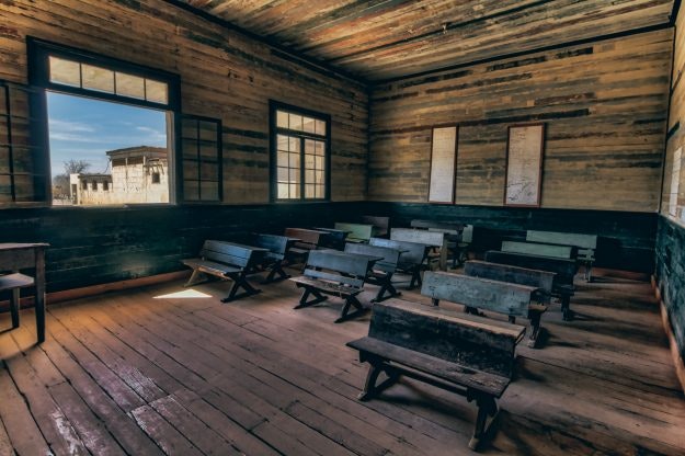 The seats are preserved well inside the town's school.