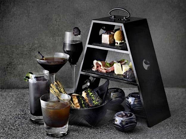 Travel News - japan2 Guests can enjoy black afternoon tea and cocktails at Japan's Black Bar. Image: Aman Tokyo