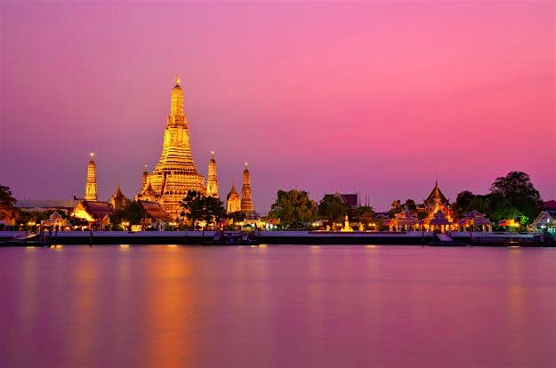 Travel News - 500px Photo ID: 28050155 - That evening, I saw the sky again. ^__^ Wat Arun at sunset in Bangkok, Thailand. Image: Jirawas Teekayu