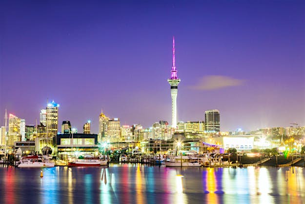 Travel News - Auckland city and harbour at dawn, New Zealand Auckland city and harbour at dawn, New Zealand.