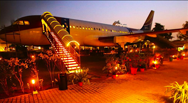 Travel News - A retired passenger jet has found a new life as a restaurant in India. Image: Hawai Adda