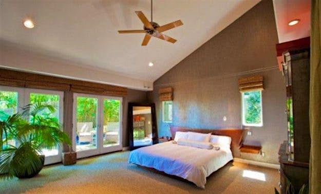 Travel News - sandrabullock1 The master bedroom features double doors to the patio area.