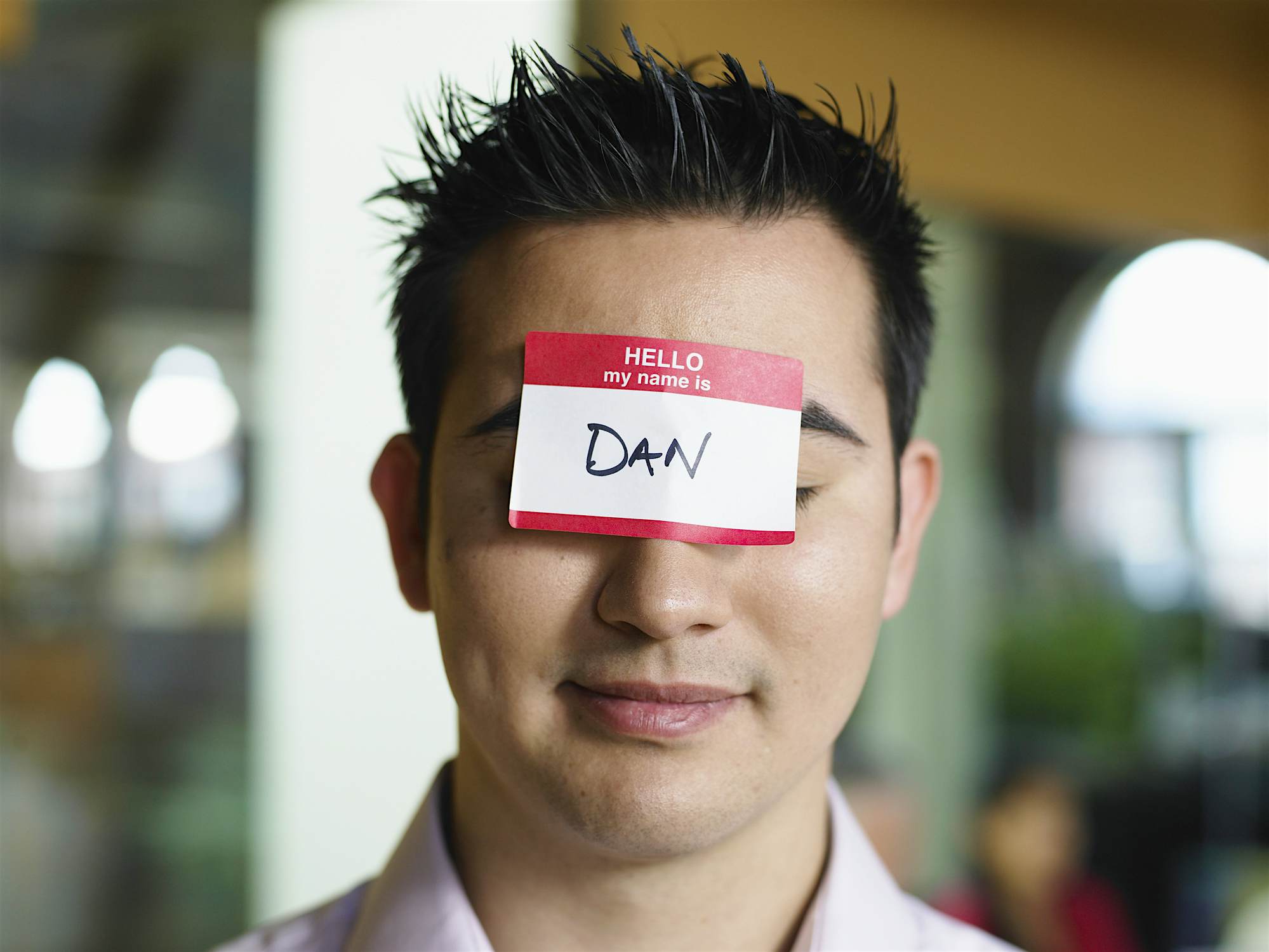 Travel News - Man with nametag on forehead A survey has identified the most adventurous names in the world. Image: Thomas Barwick