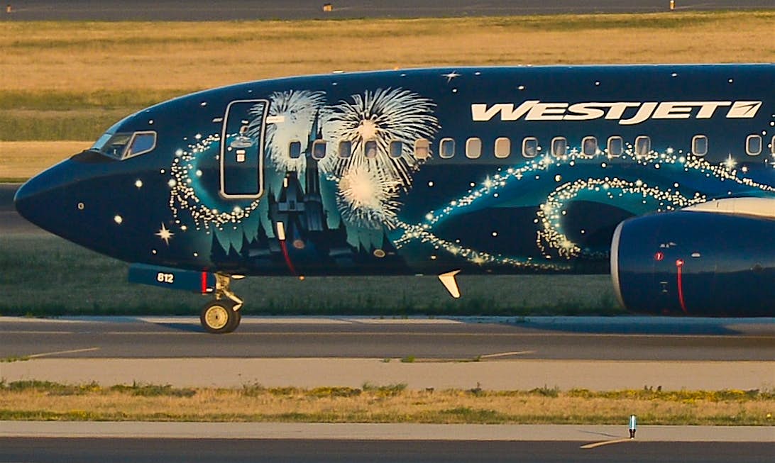 Travel News - Planes at Toronto airport WestJet plans new low-cost service.