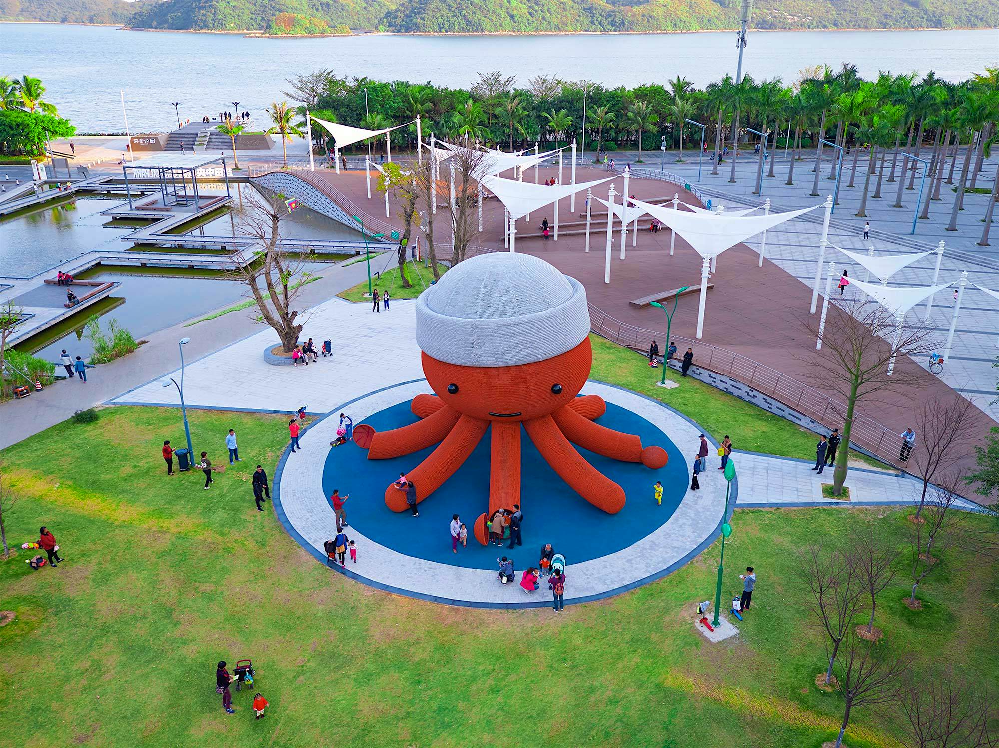 Travel News - florentijn_hofman_kraken_playground_park_overview The giant red octopus in the children's playground in Shenzen.