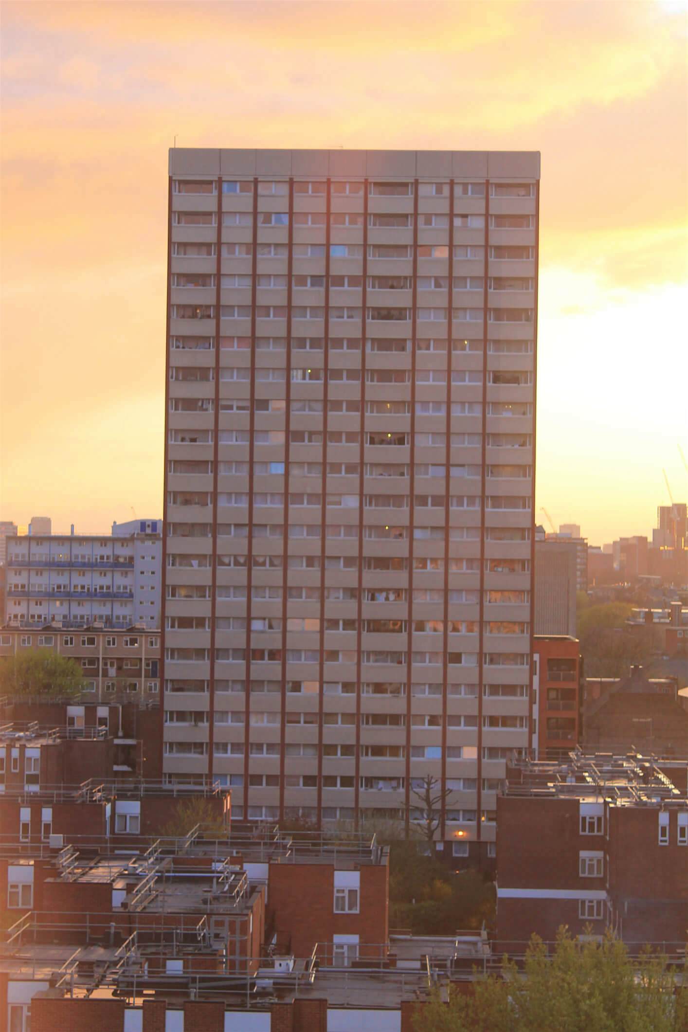 Travel News - GettyImages-171597783 (1) A tower block in Bethnal Green over looking the City, the Shard and other archiectural landmarks.