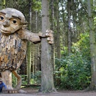 A sculpture of Little Tilde at Vallensbæk part of the west copenhagen wooden giant treasure hunt
