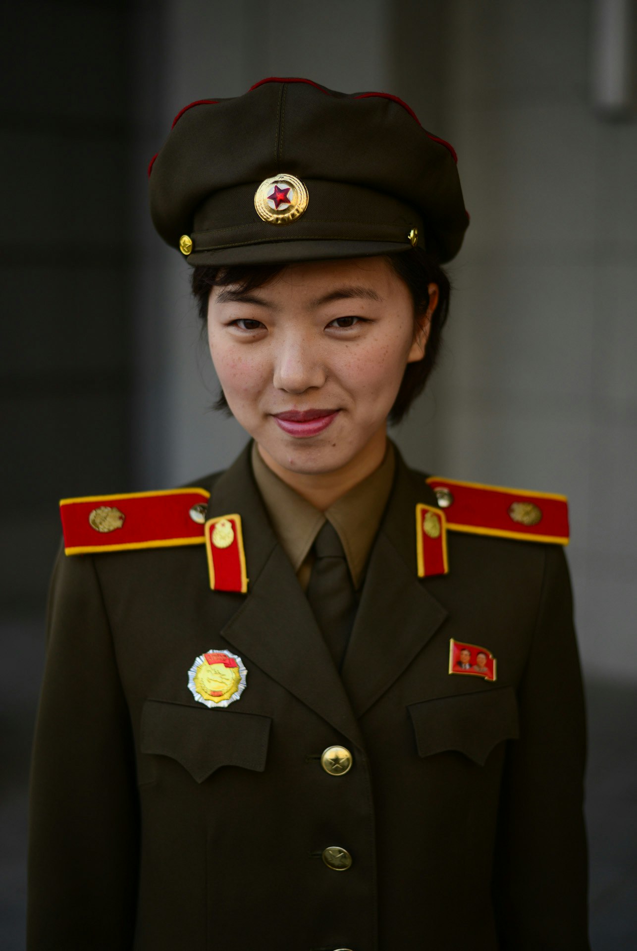 At the Victorious War Museum in Pyongyang a North Korean officer poses for the camera.