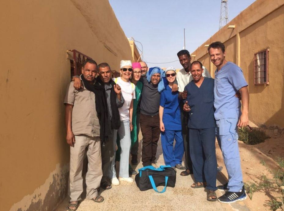 Dustin (extreme right) volunteering in a refugee camp in Saharawi in Africa.