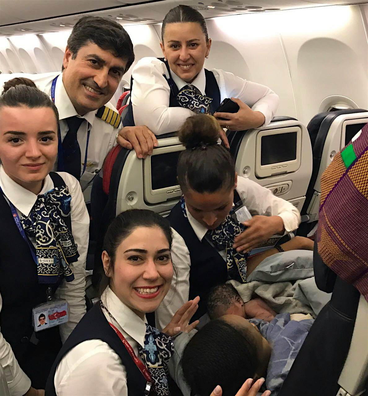 Travel News - Baby Kadiju born in a Turkish Airlines Plane Cabin crew with newborn baby on Turkish Airlines flight .
