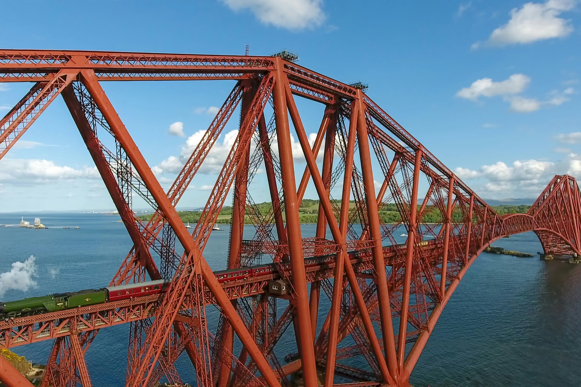 The Flying Scotsman passes over the Forth Rail Bridge to North Queens Ferry, the Kingdom of Fife.