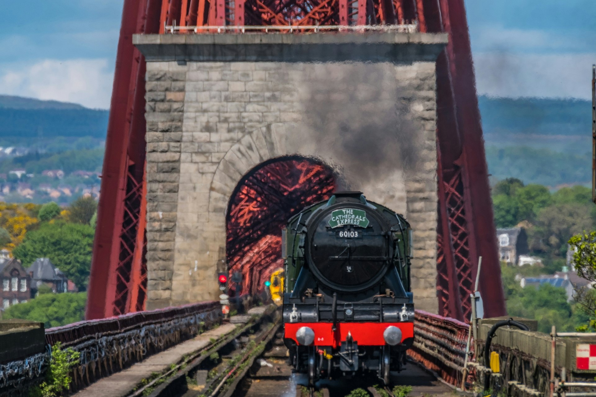 The Flying Scotsman passes over the Forth Rail Bridge to South Queens Ferry.