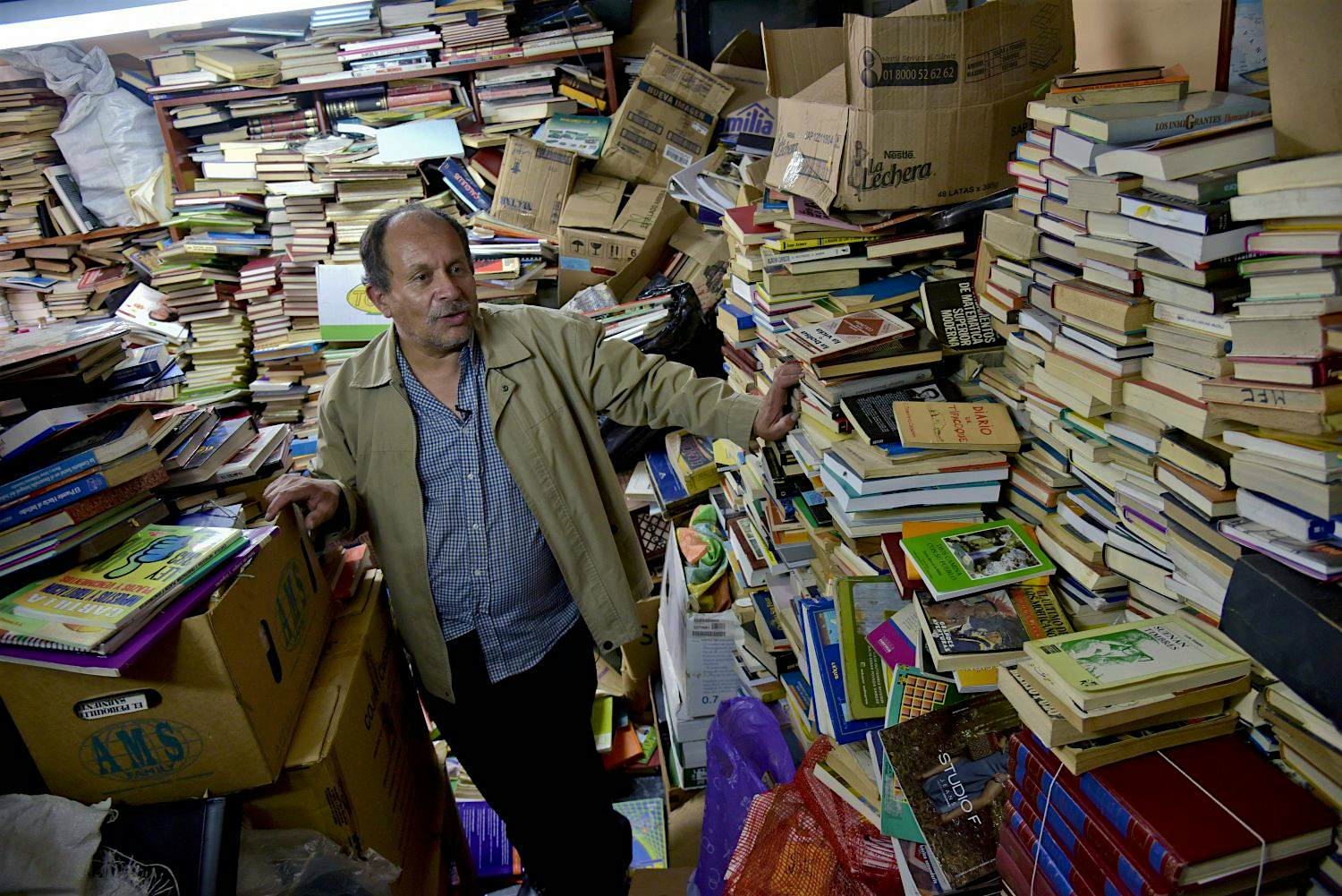 Travel News - COLOMBIA-SOCIETY-BOOKS-RESCUER Jose Alberto Gutierrez has created a free library of 20k books in his house in Bogota. Image: Guillermo Legaria/AFP/Getty Images