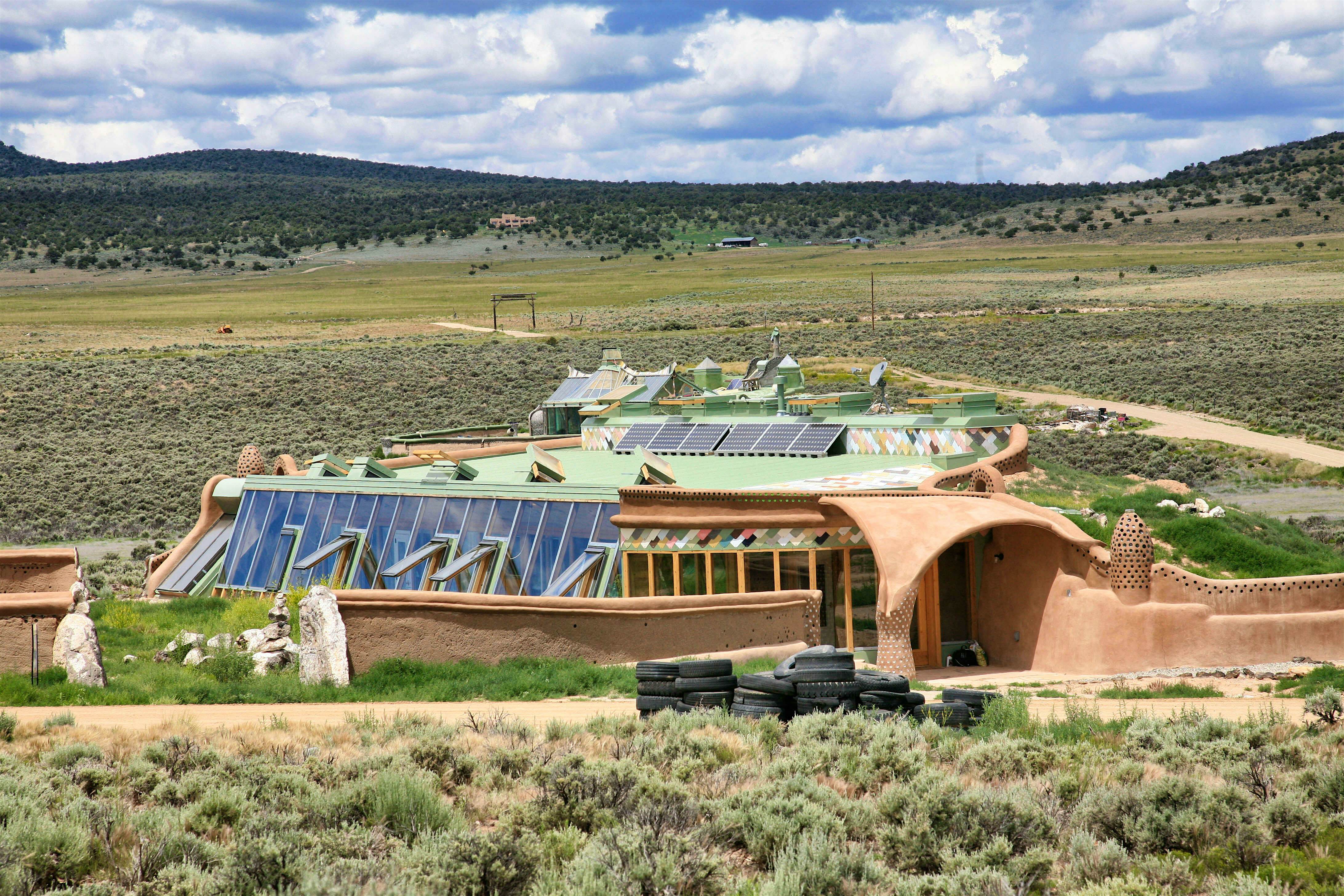 Travel News - MDRUM_Disaster_Homes-4 (1) Corner cottage Earthship in the New Mexico desert. Image by MediaDrumWorld