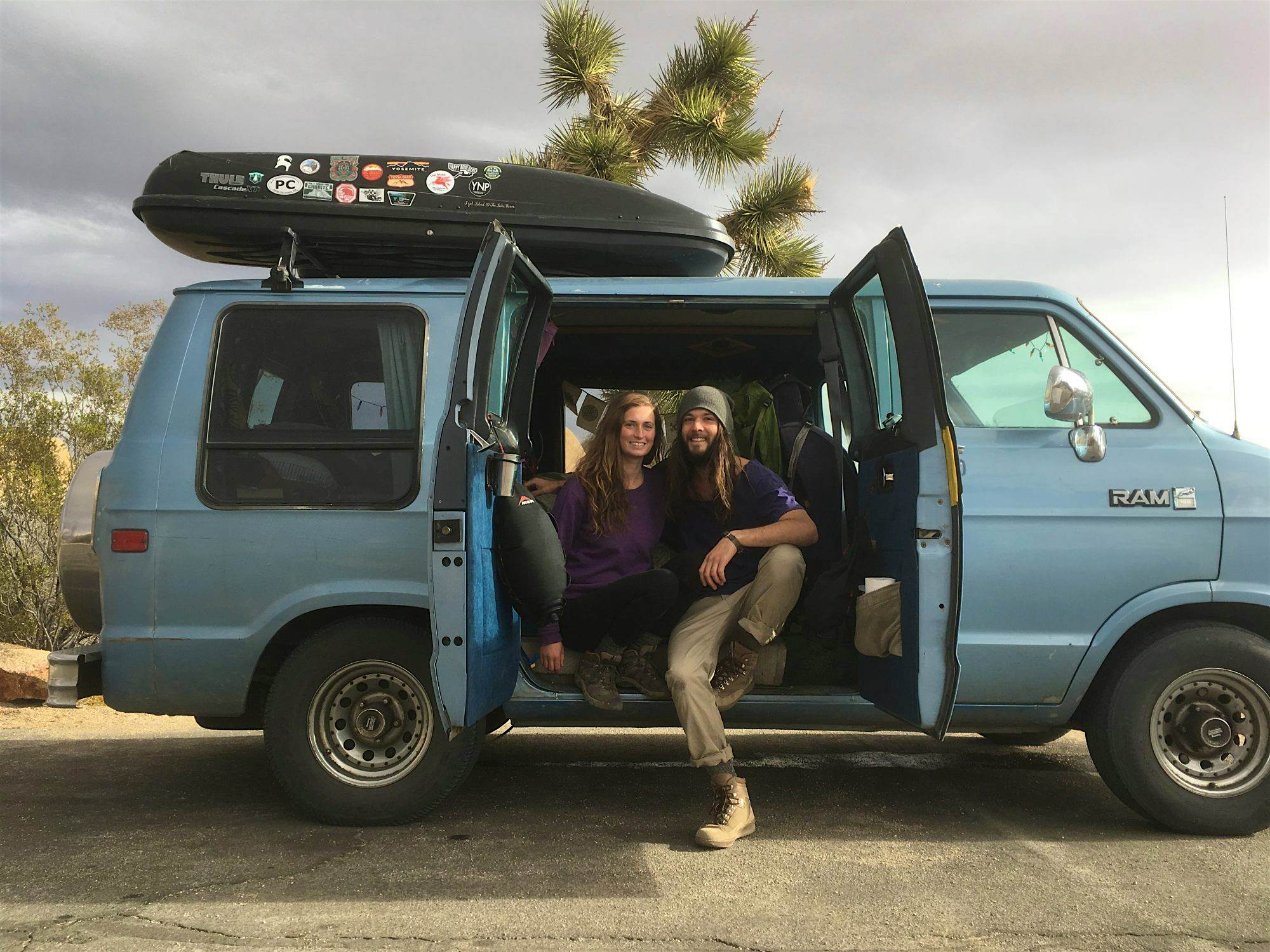 Travel News - We live here now Emily (26) and Jason Landis (26), from Louisville, Kentucky, USA relaxing outside their van.