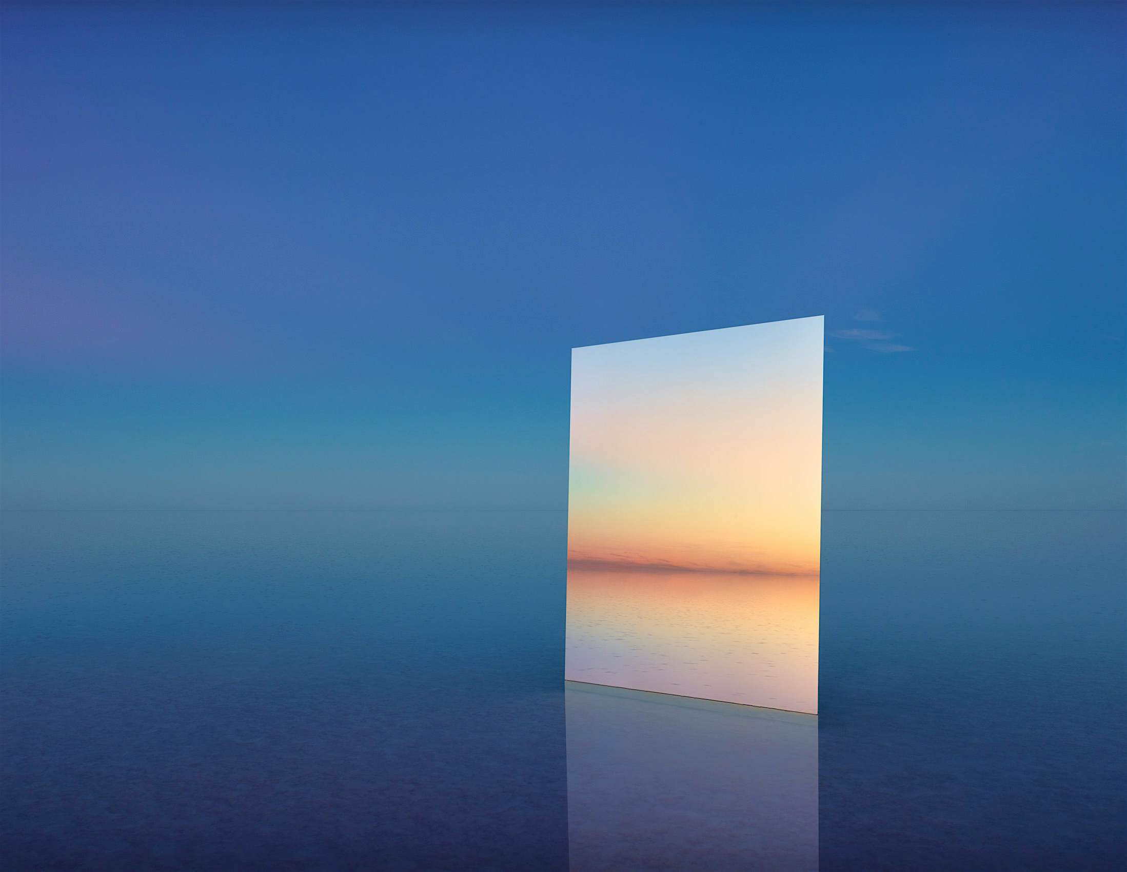 Travel News - Mirror 30 Murray Fredericks Salt Vanity photography Lake Eyre London Hamilton A mirror reflects the setting sun above the Lake Eyre salt bed in Australia