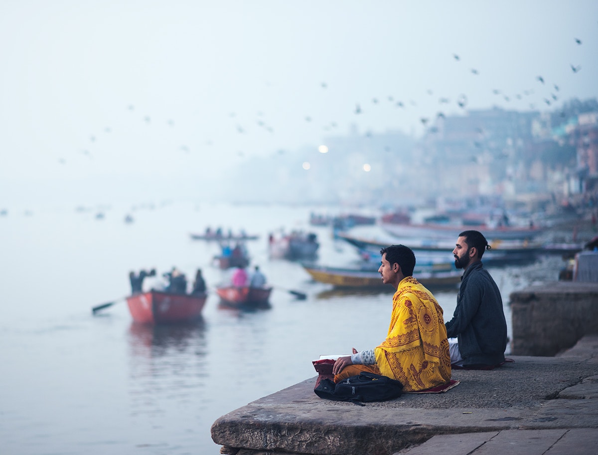 Praying on the river bank