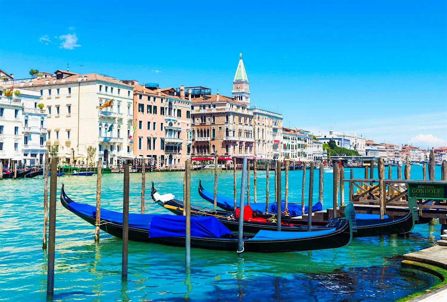 Travel News - Grand Canal with gondolas in Venice. Grand Canal with gondolas in Venice. Image: Catarina Belova/Shutterstock