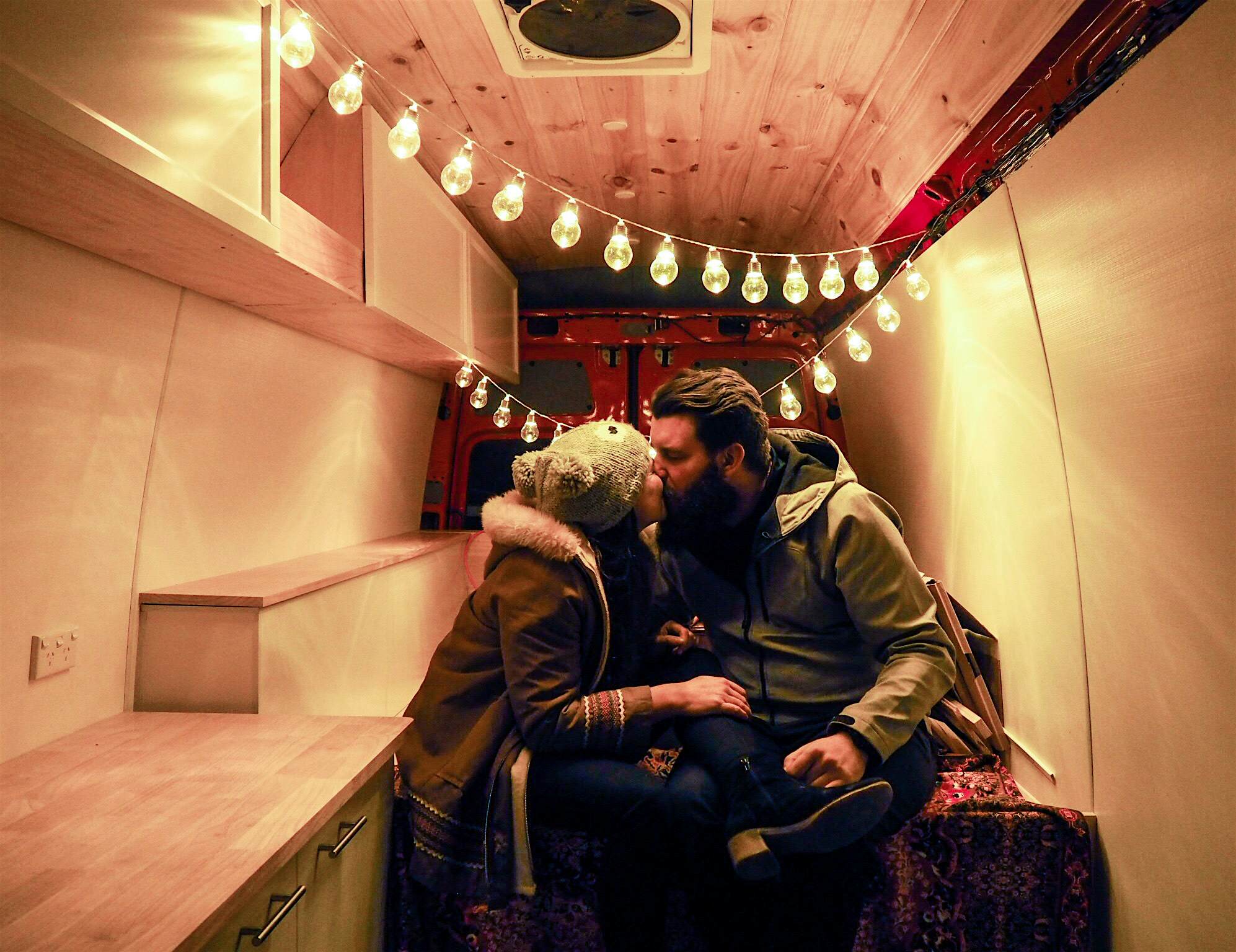 Travel News - DIY Van Life The couple insulated their sprinter van, cladding the ceiling.