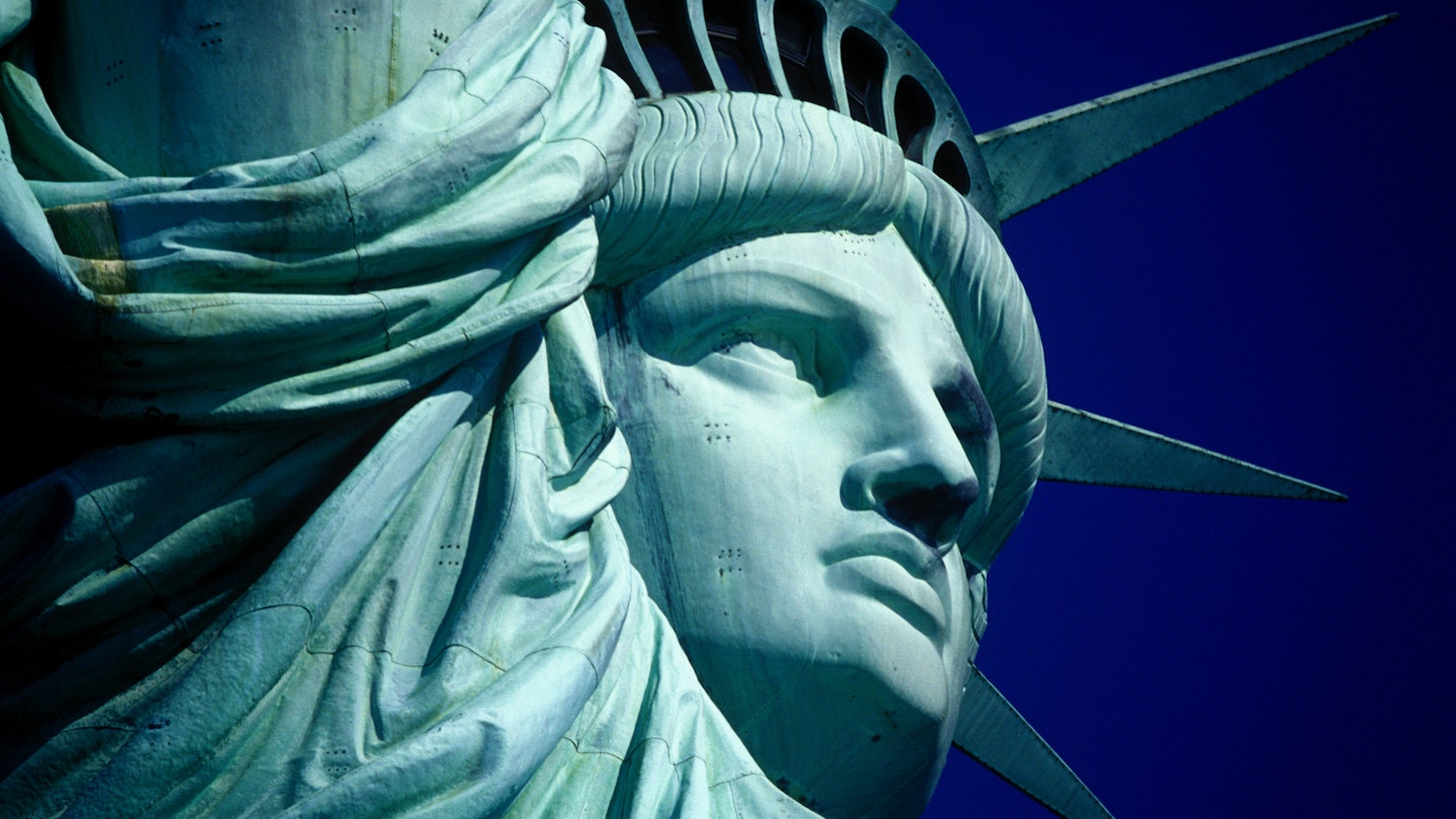 The iconic blue-green colored Statue of Liberty