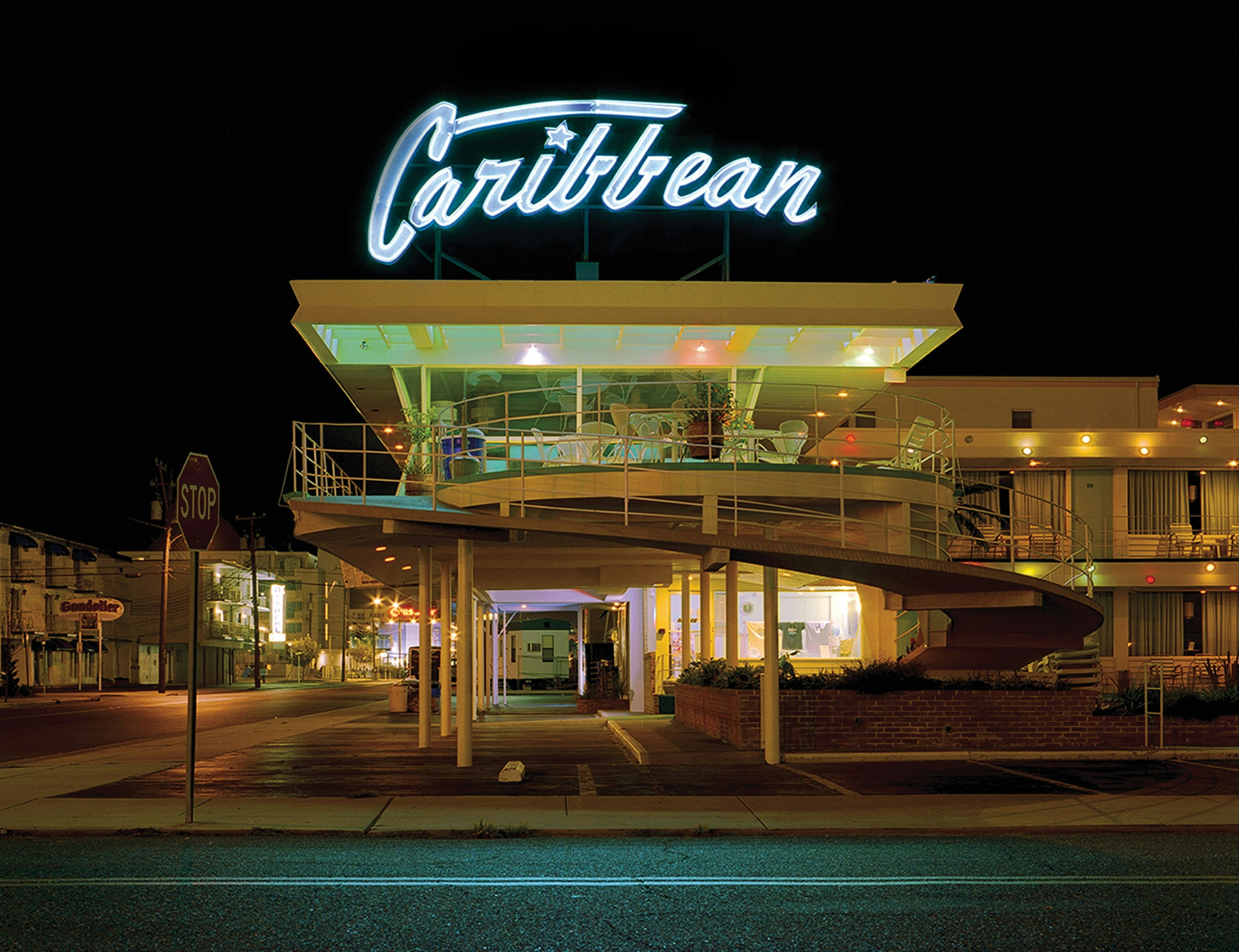 This photograph of the Caribbean, shot in 2007, showcases the distinctive curved ramp leading to the motel's second level.