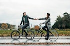 A couple cycle in Copenhagen