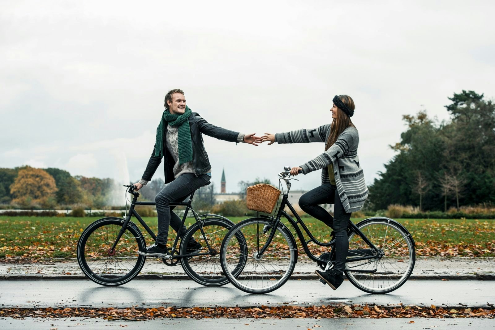 A couple cycle in Copenhagen