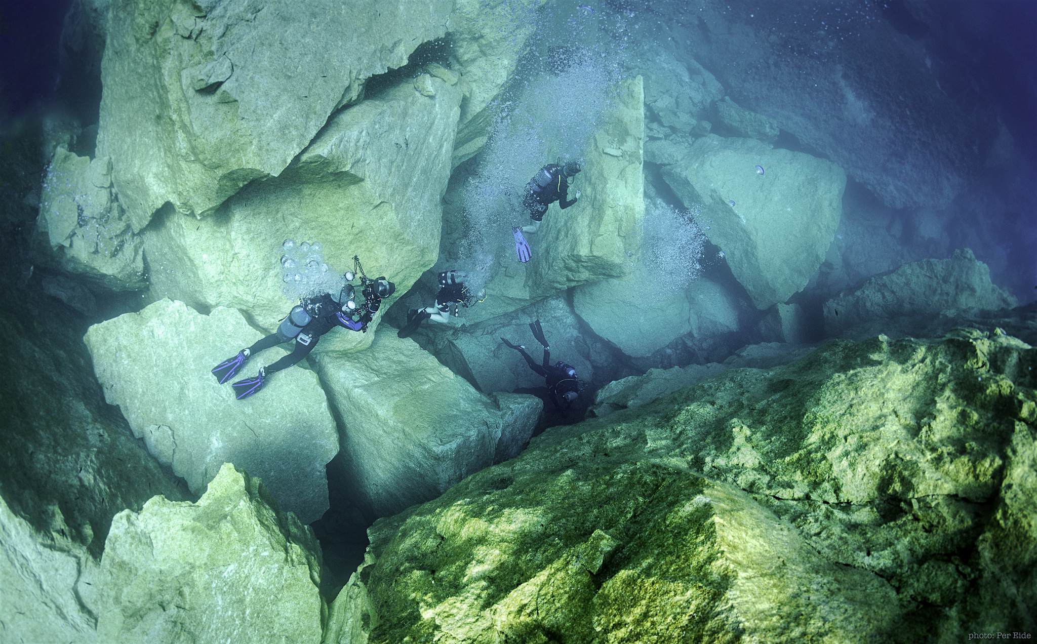 Travel News - Divers explore what's left of Malta's Azure Window Per Eide Divers among the boulders
