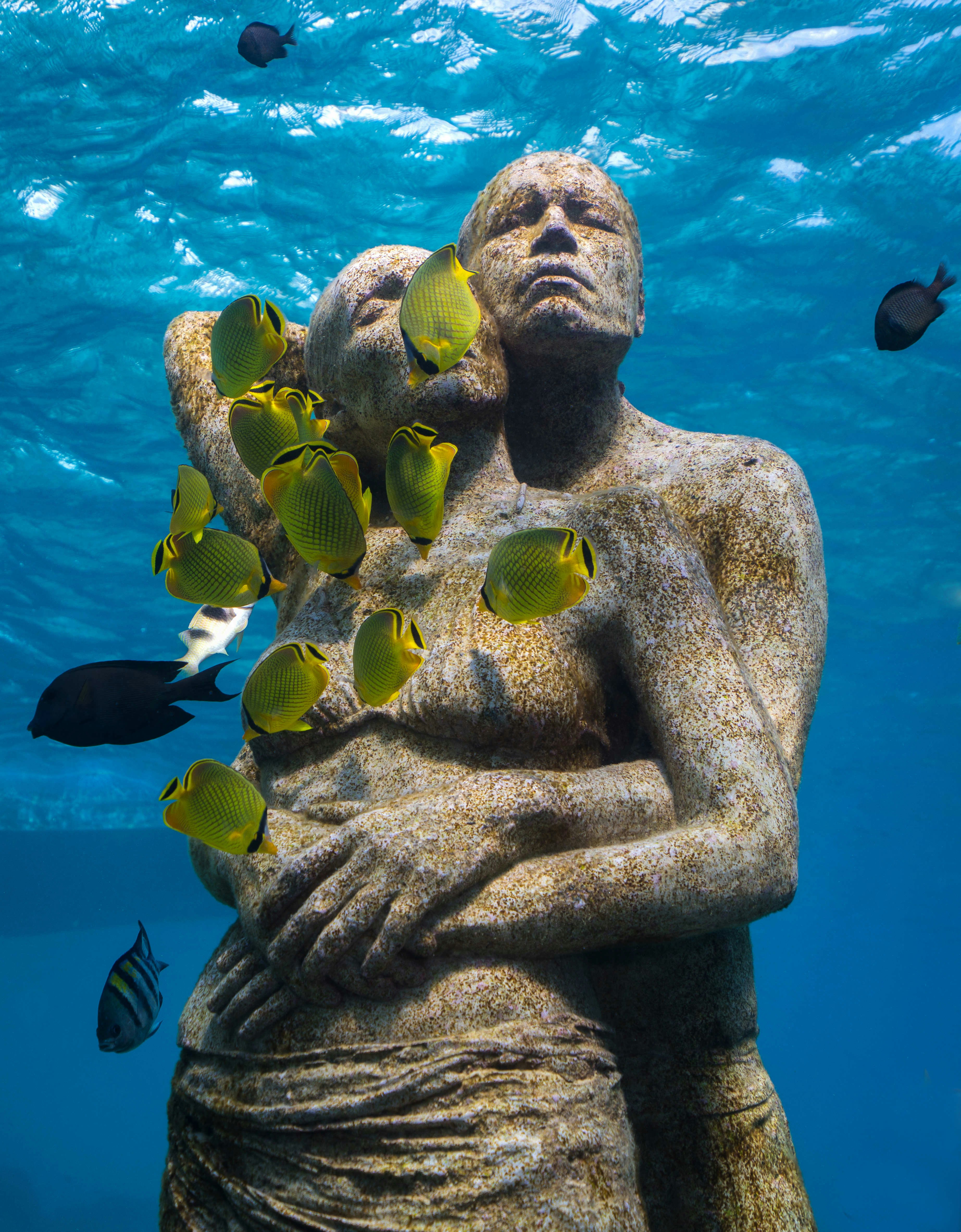 Divers can swim down to see Jason deCaires Taylor's sculpture. 