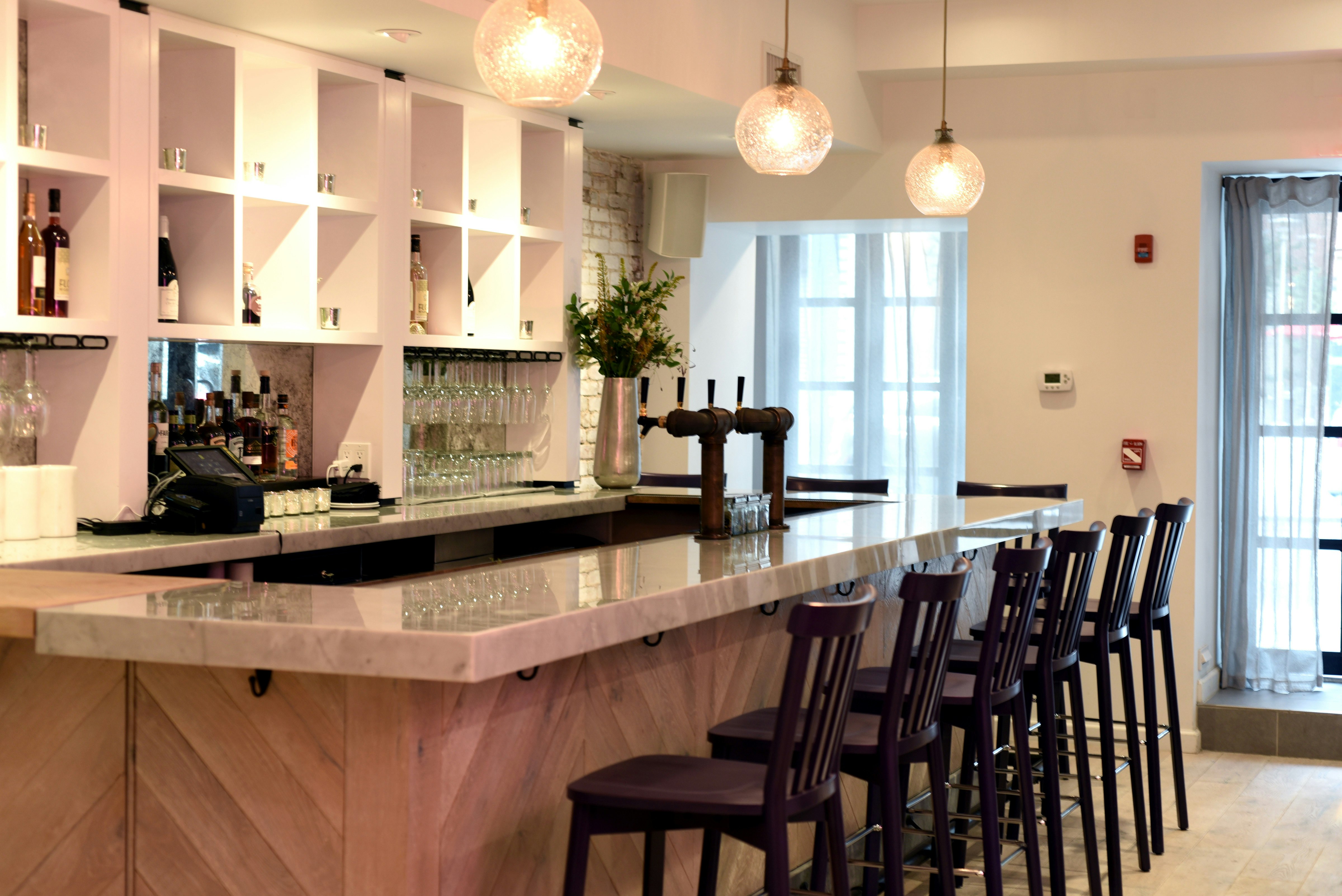 Enjoy a drink at the P.S. Kitchen bar 