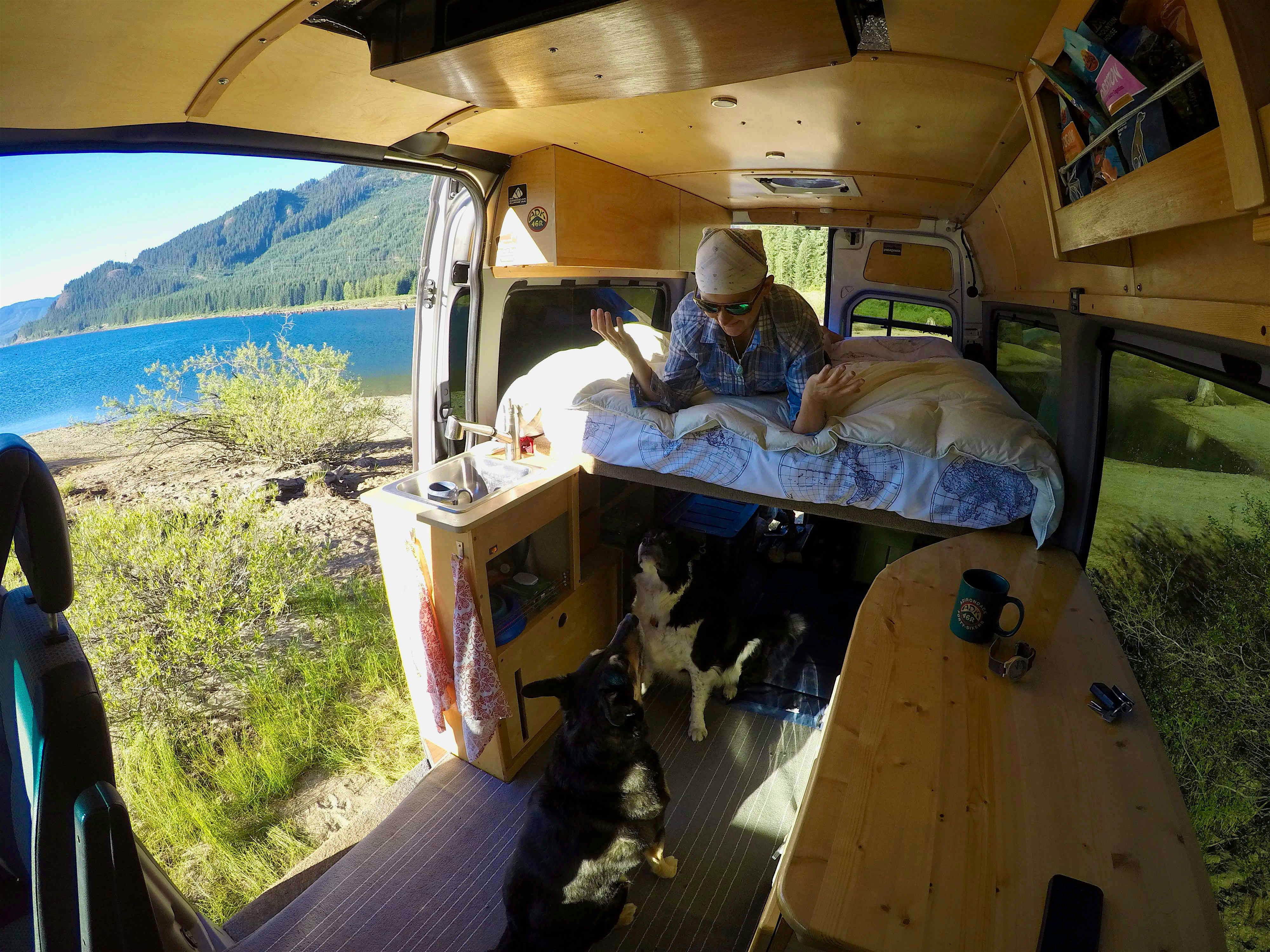 Travel News - Bryce DaLuc and her two collies Tonto and Finn Bryce relaxing with her dogs