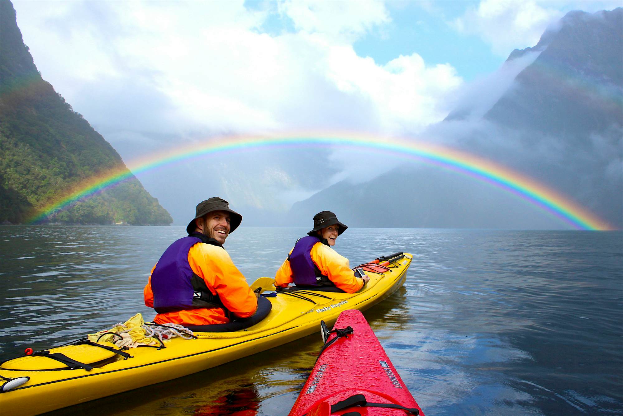 Travel News - Milford Sound NZ HoneyTrek.com Anne and Mike Howard at Milford Sound in New Zealand.