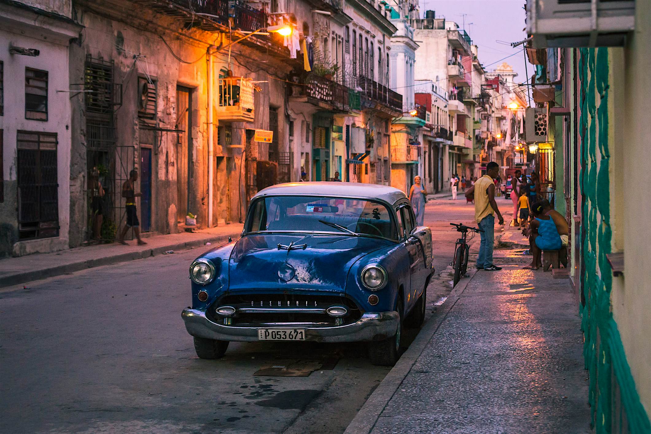 Travel News - havana at night Classic car sat on on a back street in Havana as the light begins to fade.