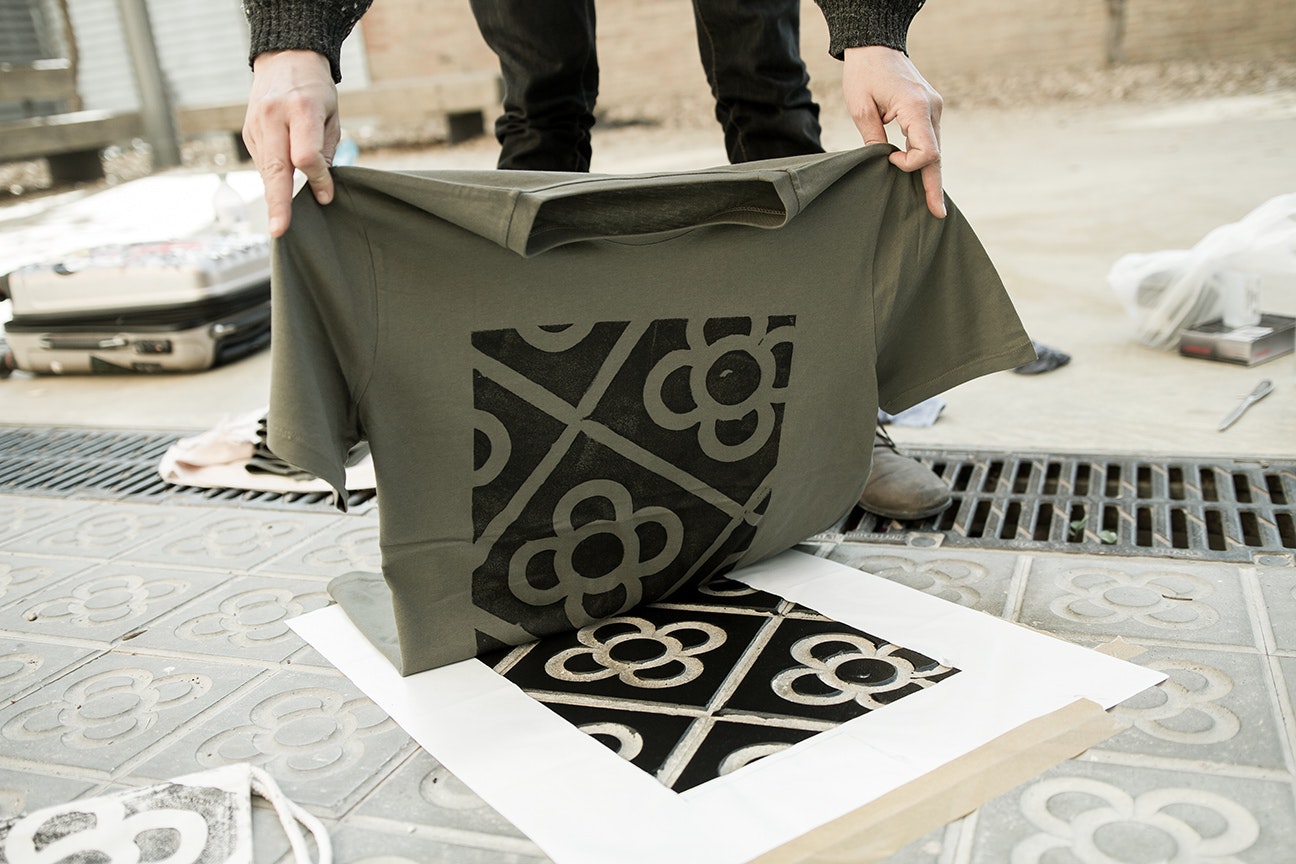 A t-shirt being printed on the street in Barcelona. 