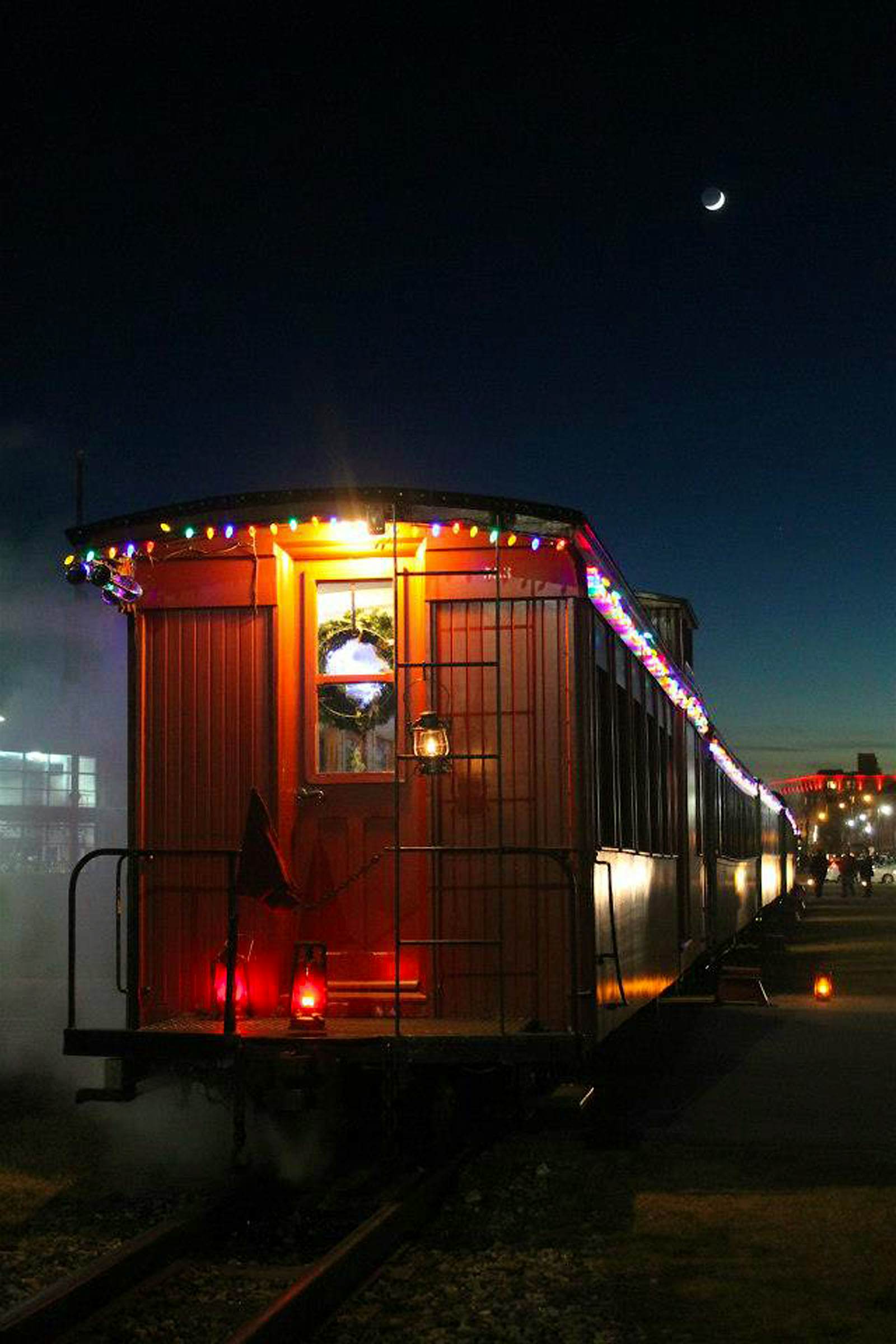 Travel News - Caboose with Moon over Portland Travel News - Caboose with Moon over Portland